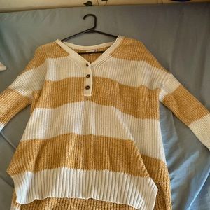 White and tan sweater